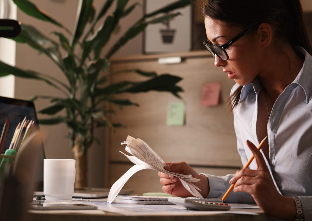 A woman gathering necessary documents for applying IRS fresh start program