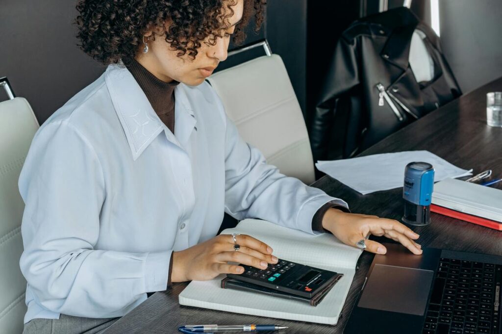 A woman calculating tax