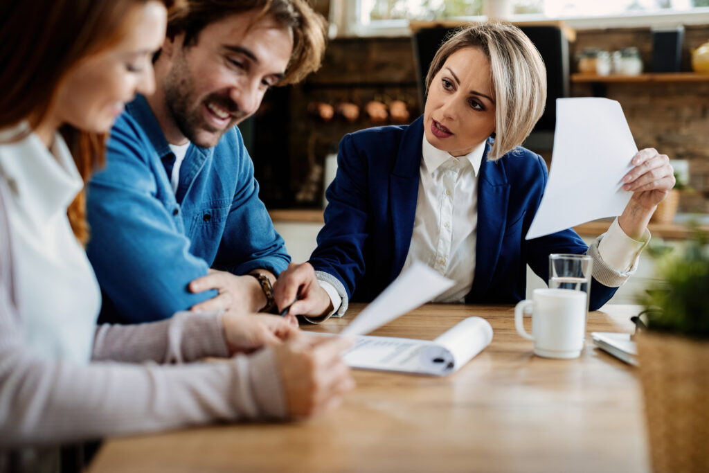 A couple consulting a tax expert 
