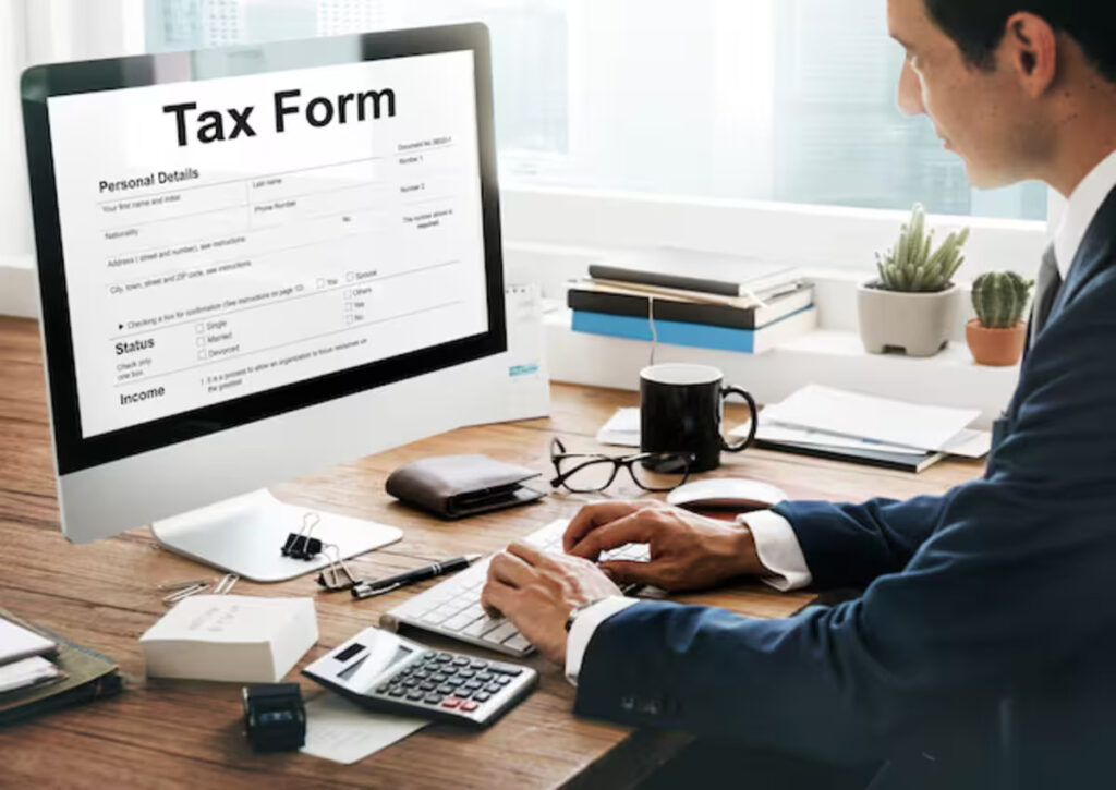 A man filing his tax obligations online