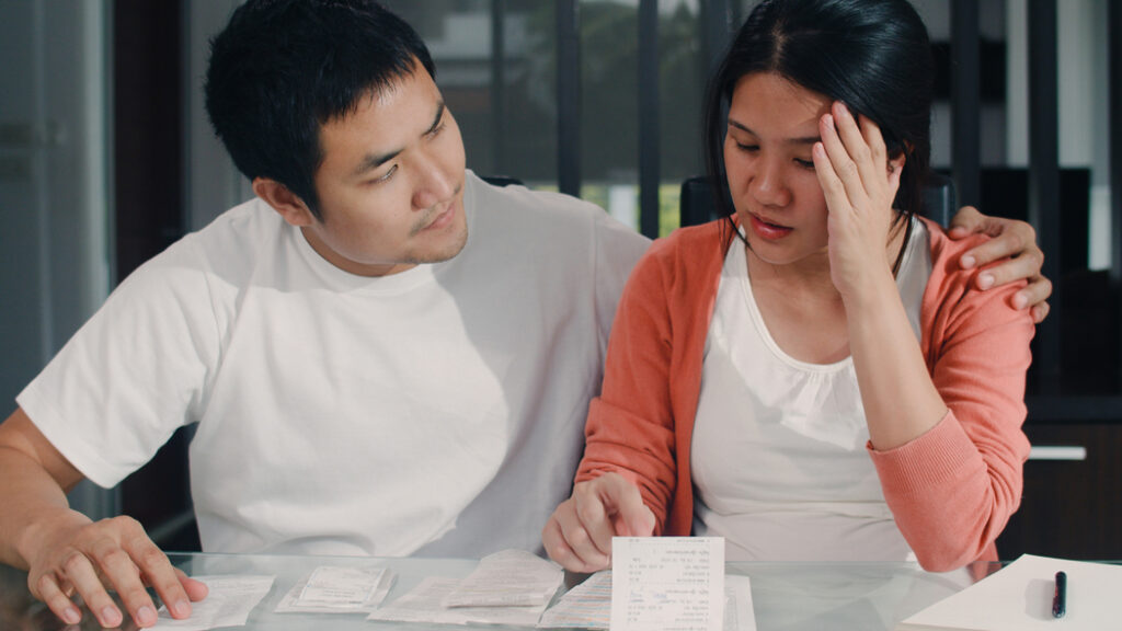 Couple thinking about getting offer in compromise