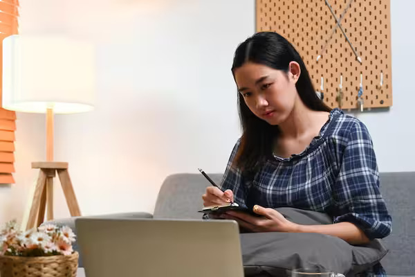 A young woman researching online to see if she qualifies to apply for the Innocent Spouse Relief Program